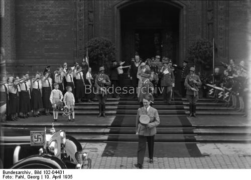 Adolf Hitler leaves Berlin's Rathaus after the civil wedding of the Görings